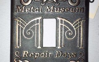 2014 Repair Days Switchplate Auction Piece, Bronze